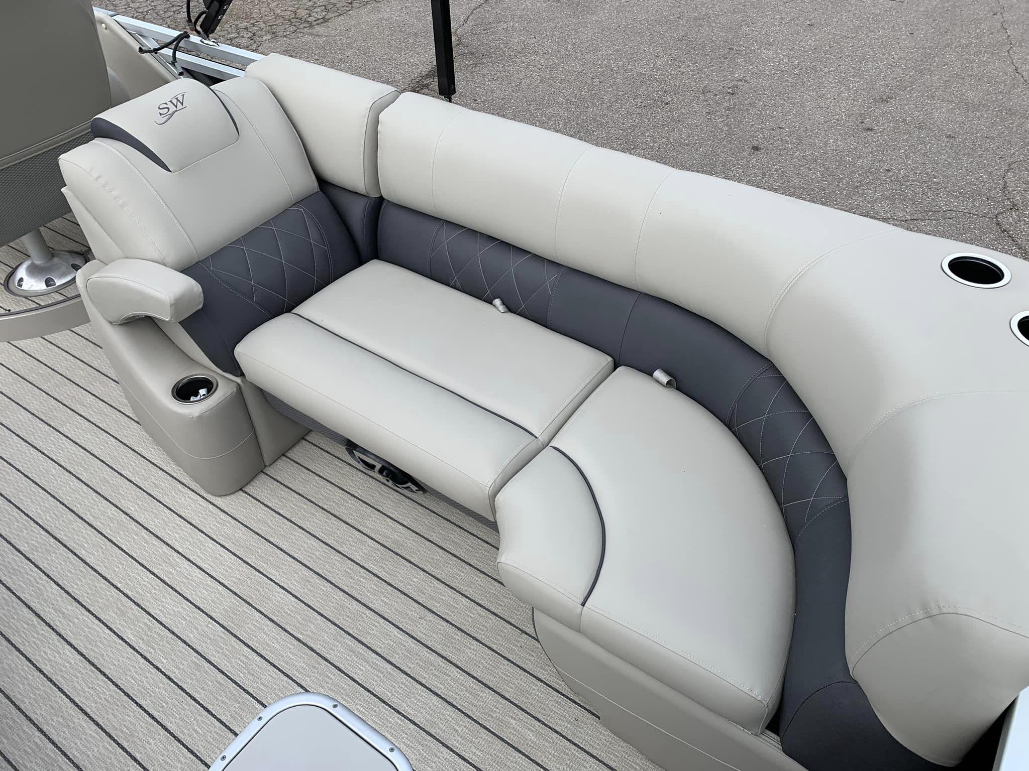 Slide: The Image of Luxurious seating on 2024 Silver Wave 2610 SW5 CLS boat with cup holders. - 9