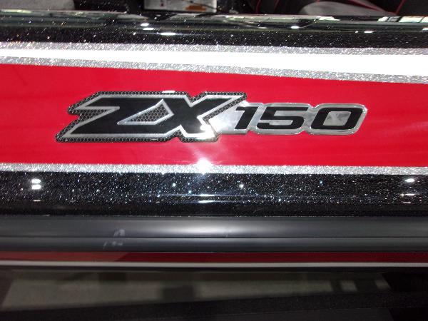 Slide: The Image of 2024 Skeeter ZX-150 boat model logo on red and black exterior. - 10