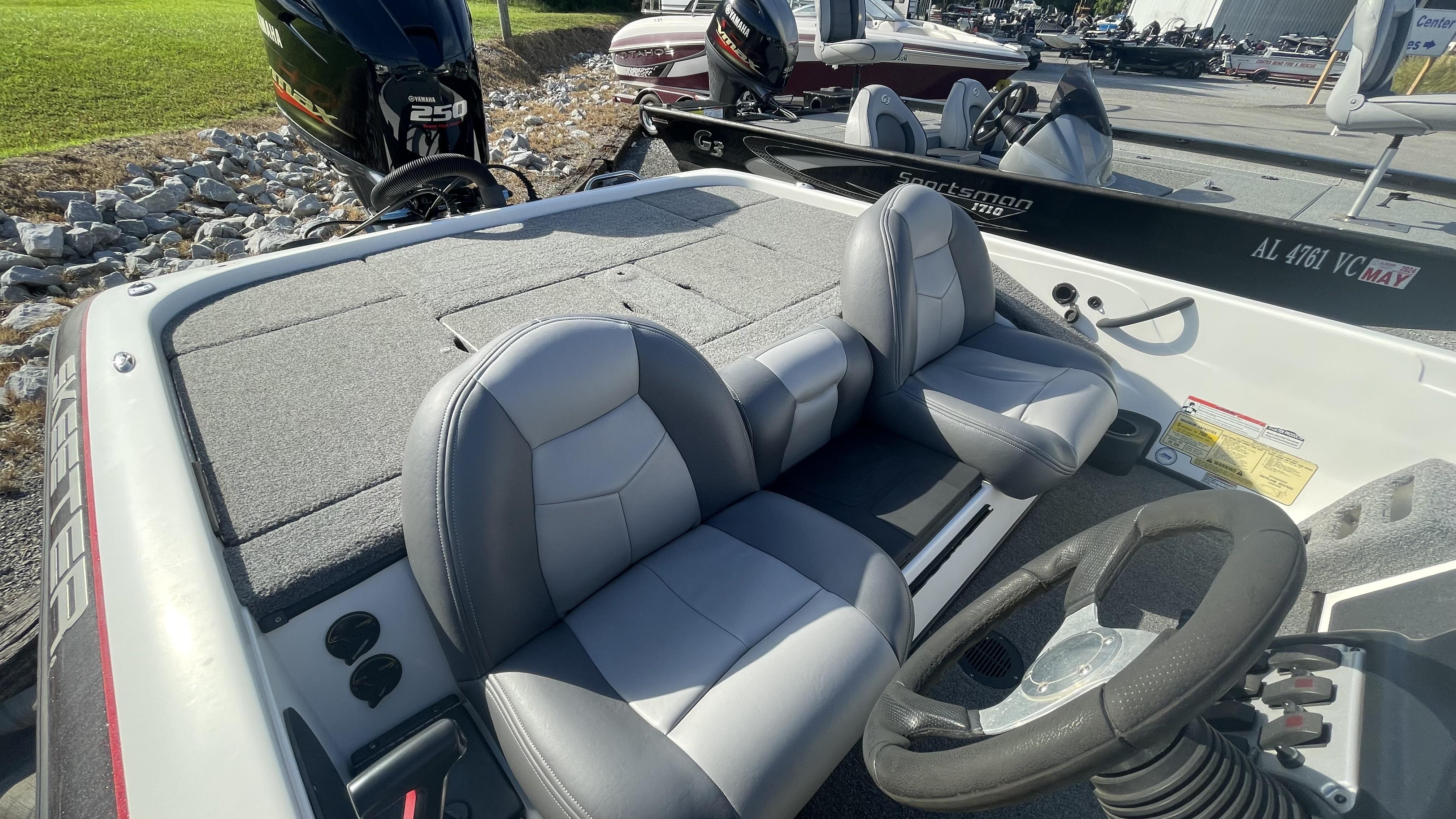 Slide: The Image of 2011 Skeeter ZX225 boat interior with Yamaha 250 engine. - 7