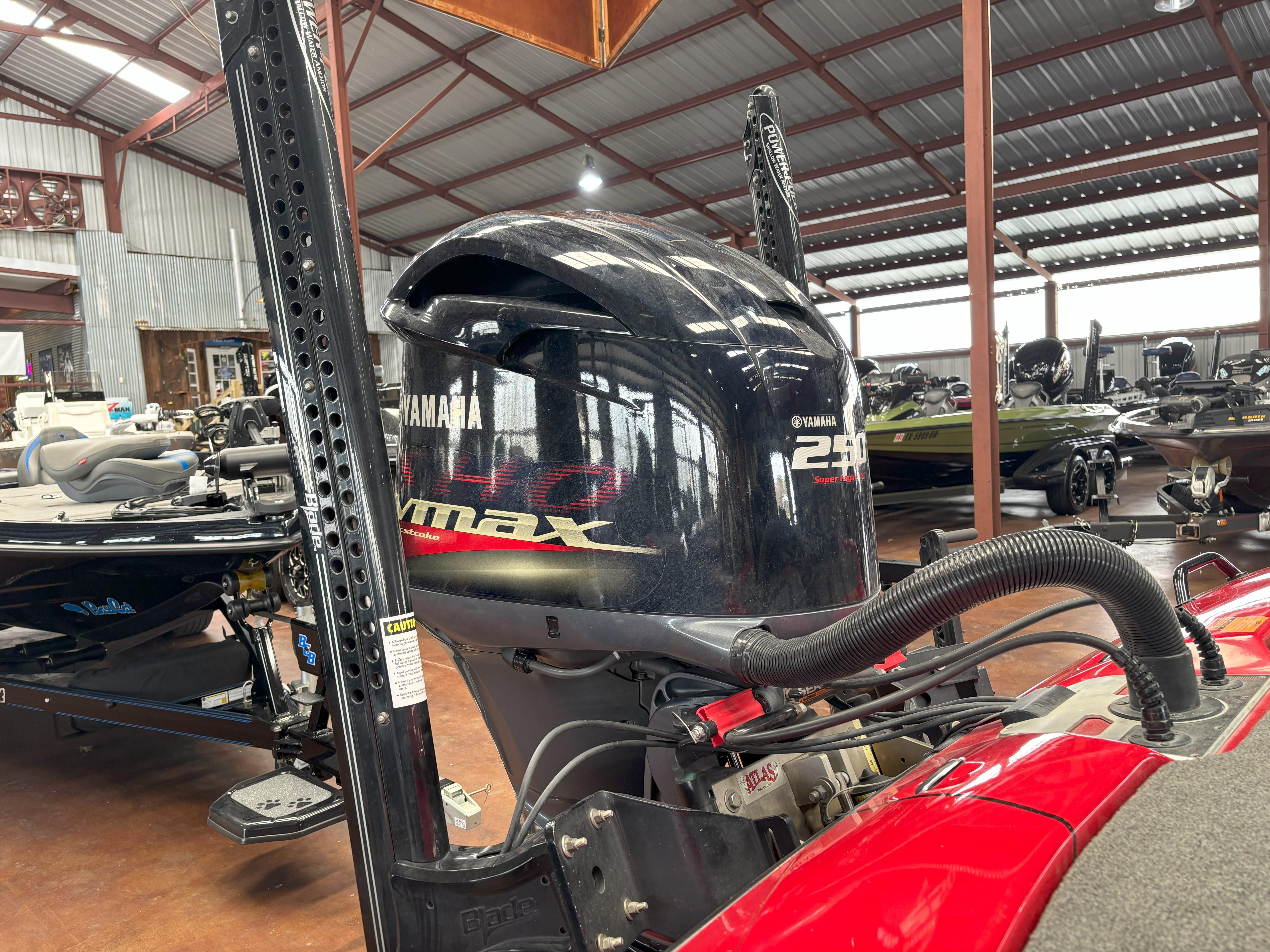Slide: The Image of 2020 Skeeter FXR20 Apex with Yamaha 250 VMAX engine in a boat showroom. - 20