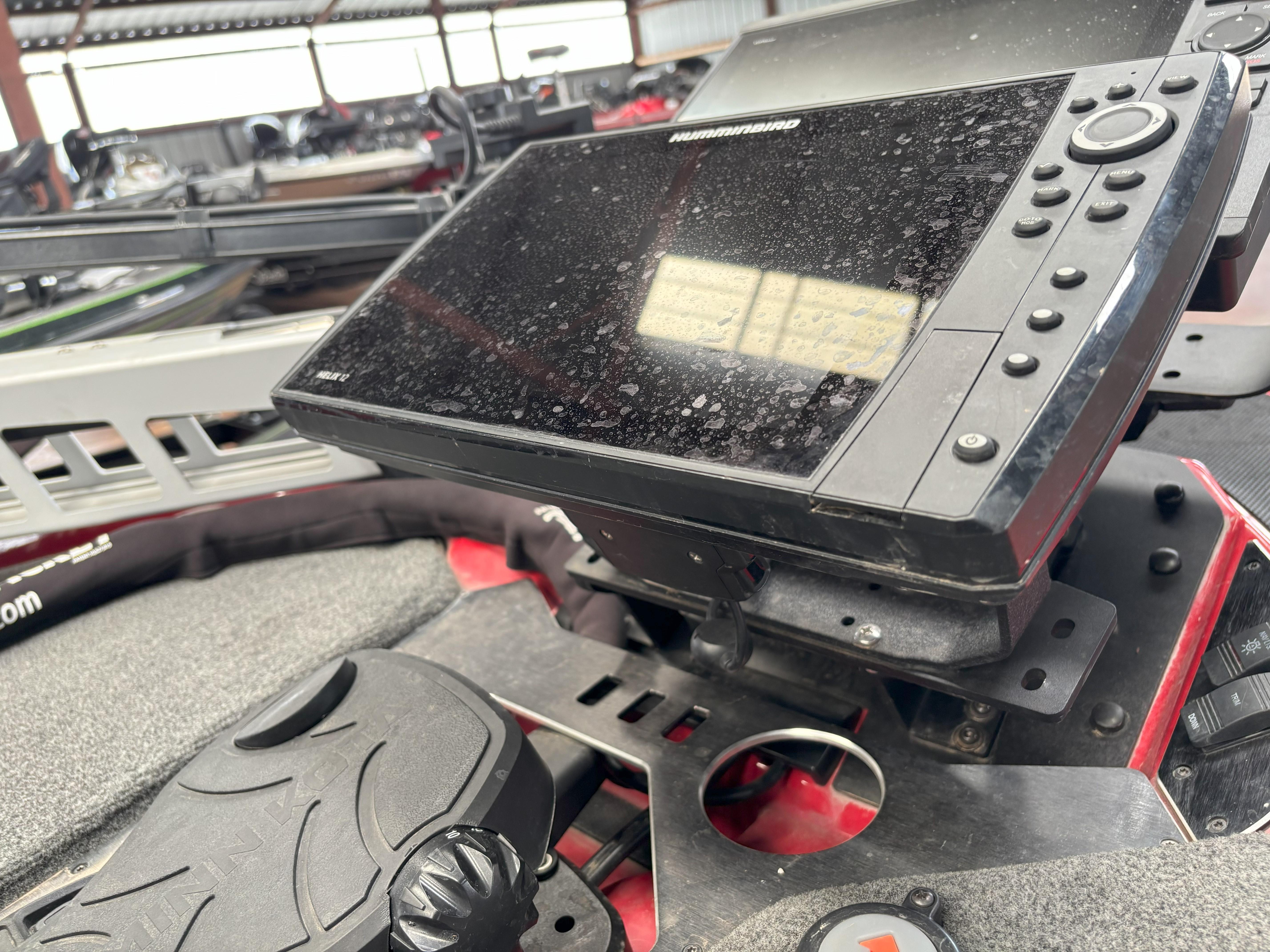 Slide: The Image of 2020 Skeeter FXR20 Apex boat with Humminbird fishfinder and control panel. - 4