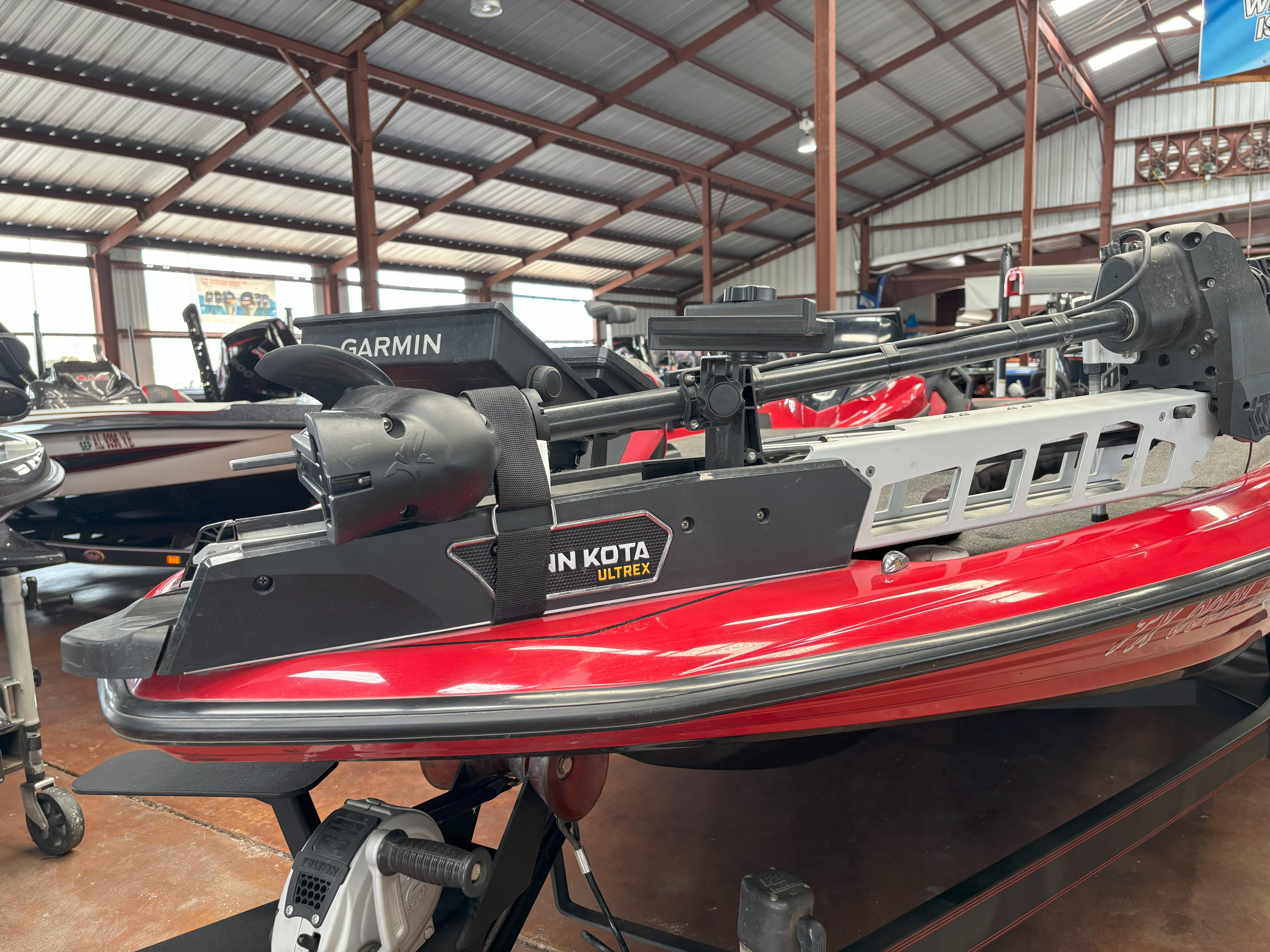 Slide: The Image of 2020 Skeeter FXR20 Apex boat with Minn Kota Ultrex motor in a showroom. - 5