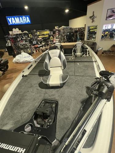 Slide: The Image of 2023 Skeeter FXR21 Limited fishing boat in showroom with Yamaha equipment. - 11
