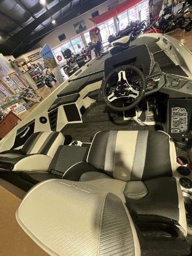 Slide: The Image of 2023 Skeeter FXR21 Limited boat interior with modern dashboard and seating. - 2