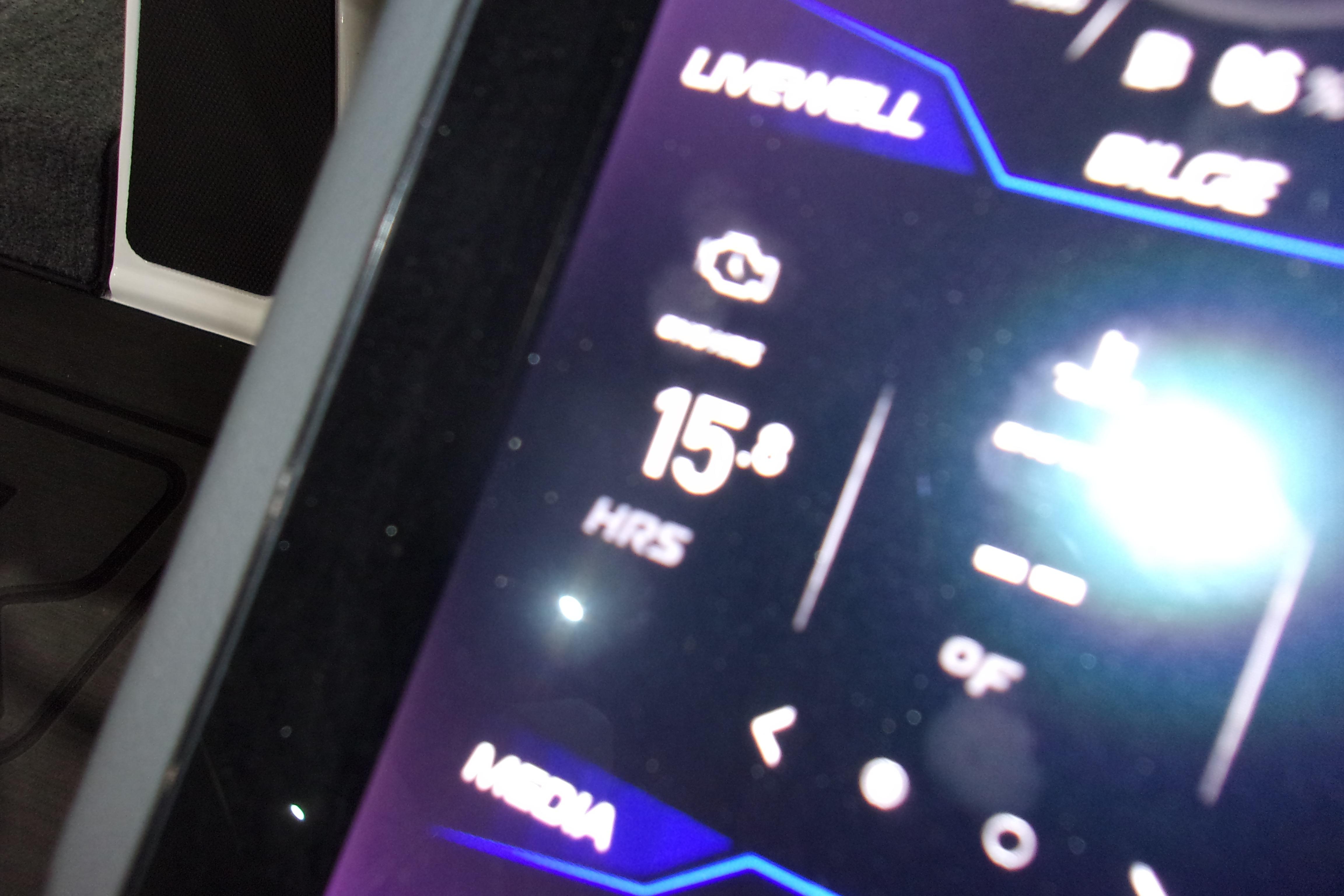 Slide: The Image of Close-up of 2025 Skeeter FXR21 Limited boat display showing 15.8 hours. - 11