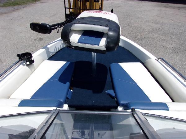 Slide: The Image of 2007 Skeeter SL 180 boat interior with blue and white seating. - 10