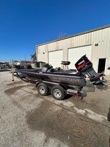 Slide: The Image of 2003 Skeeter SX 200 boat with Yamaha VMAX engine on trailer. - 17
