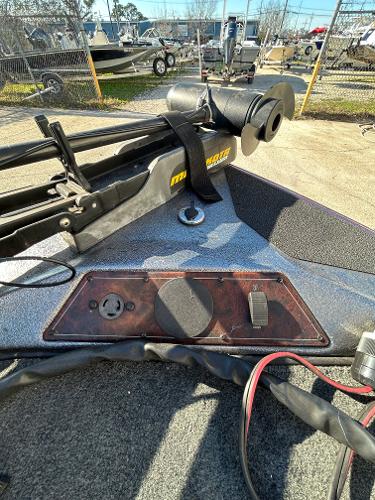 Slide: The Image of 2003 Skeeter SX 200 boat with trolling motor and control panel. - 22