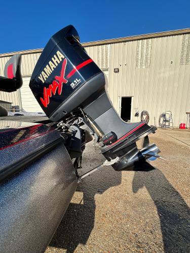 Slide: The Image of 2003 Skeeter SX 200 boat with Yamaha VMAX 3.1L outboard motor. - 35