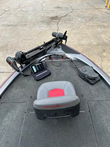 Slide: The Image of 2003 Skeeter SX 200 boat deck with fishing seat and equipment. - 38
