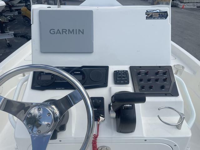 Slide: The Image of 2023 Skeeter SX210 boat console with Garmin navigation system and Yamaha controls. - 10