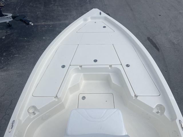 Slide: The Image of 2023 Skeeter SX210 boat bow with storage compartments. - 11