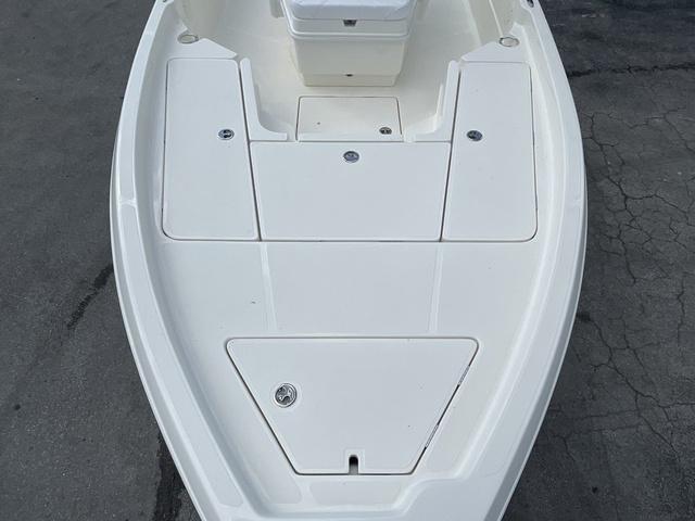 Slide: The Image of 2023 Skeeter SX210 boat deck with storage compartments. - 13