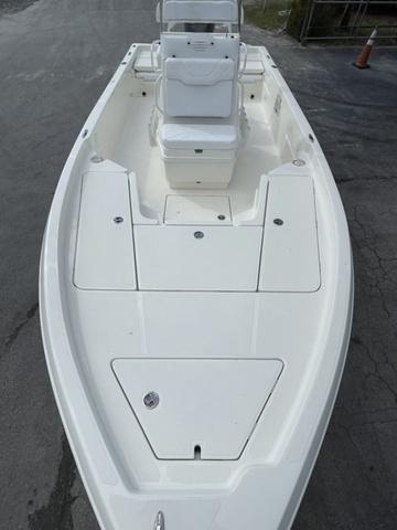 Slide: The Image of 2023 Skeeter SX210 boat with white deck and seating. - 14