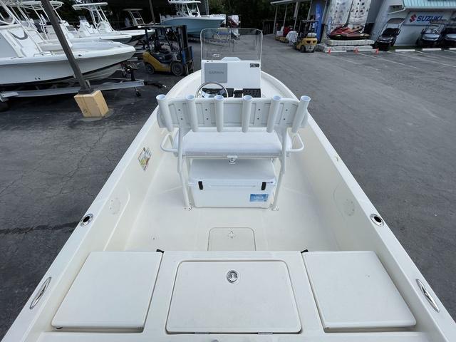 Slide: The Image of 2023 Skeeter SX210 boat interior with seating and storage compartments. - 8