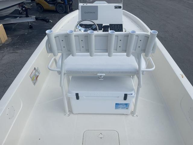 Slide: The Image of 2023 Skeeter SX210 boat interior with Garmin navigation and rod holders. - 9