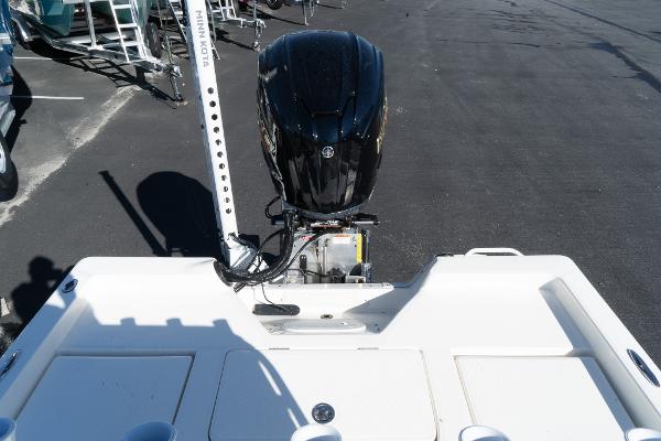 Slide: The Image of 2024 Skeeter SX 210 boat with Minn Kota motor, rear view. - 7
