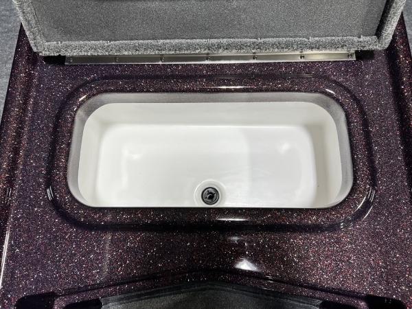 Slide: The Image of 2024 Skeeter ZX150 livewell with glittery finish. - 12