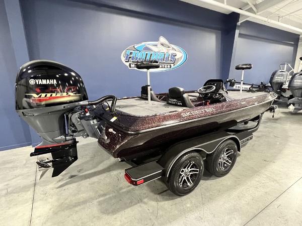 Slide: The Image of 2024 Skeeter ZX150 bass boat with Yamaha VMAX engine in showroom. - 2