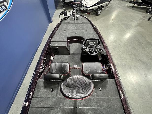 Slide: The Image of 2024 Skeeter ZX150 fishing boat interior with seating and control console. - 24