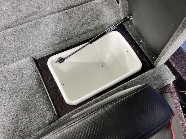 Slide: The Image of 2024 Skeeter ZX150 boat storage compartment with hydraulic lift. - 26