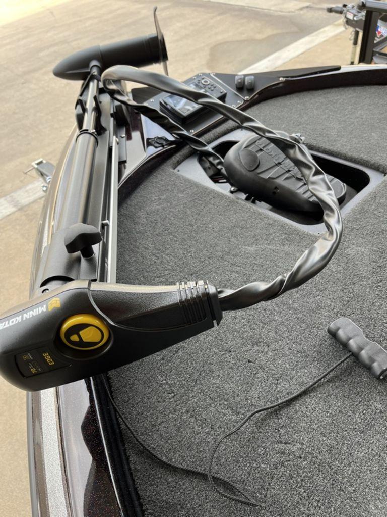Slide: The Image of Close-up of 2024 Skeeter ZX150 boat with Minn Kota trolling motor. - 8