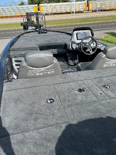 Slide: The Image of 2024 Skeeter ZX 200 fishing boat interior with steering console and seating. - 4