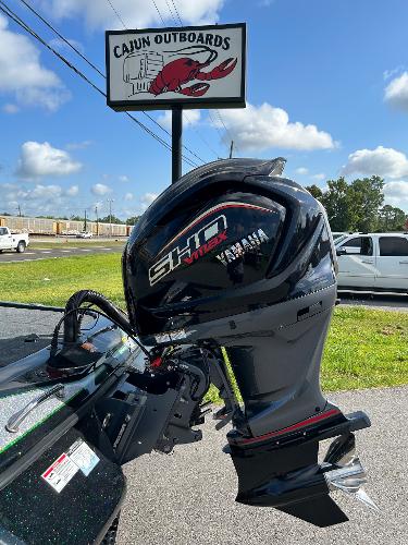 Slide: The Image of 2024 Skeeter ZX 200 with Yamaha SHO motor at Cajun Outboards dealership. - 6