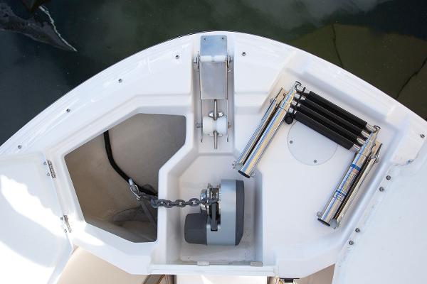 Slide: The Image of Manufacturer Provided Image: Anchor compartment of 2025 Solara S-250 CW boat with chain and accessories. - 26