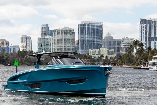 Slide: The Image of 2024 Solaris Power 52 Open yacht cruising near city skyline. - 1