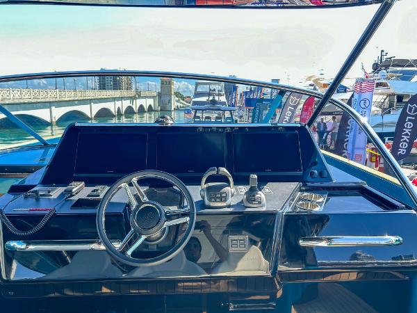 Slide: The Image of Helm of 2024 Solaris Power 52 Open yacht with modern navigation equipment. - 12