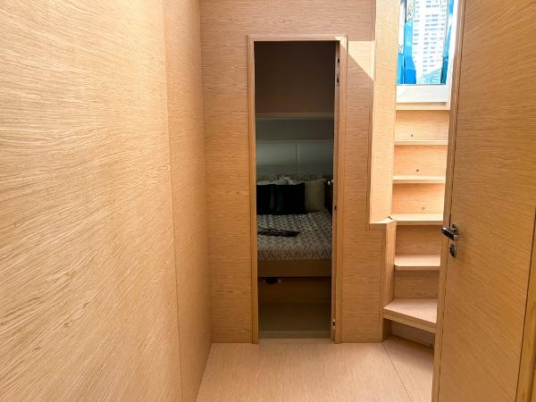 Slide: The Image of Interior cabin of 2024 Solaris Power 52 Open yacht with wooden finish and stairs. - 16