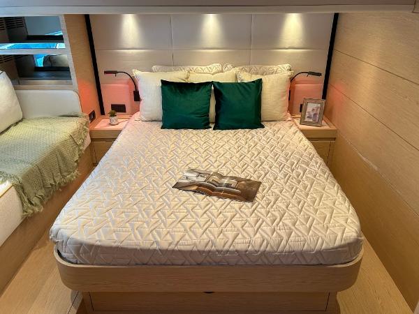 Slide: The Image of Luxurious bedroom interior of 2024 Solaris Power 52 Open yacht with modern decor. - 19