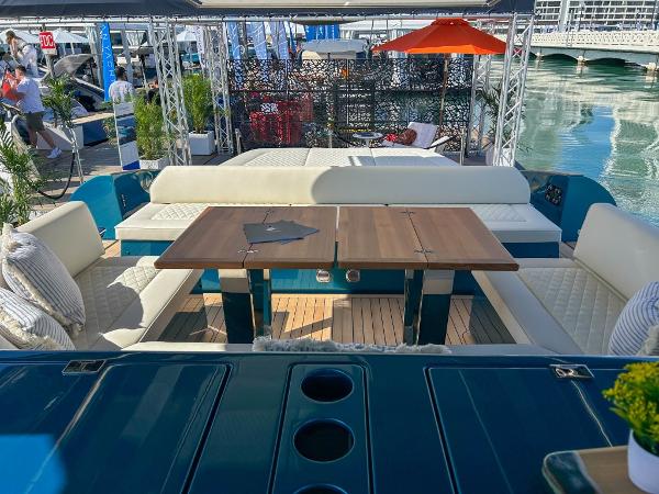 Slide: The Image of 2024 Solaris Power 52 Open luxury yacht with elegant seating and dining area. - 24