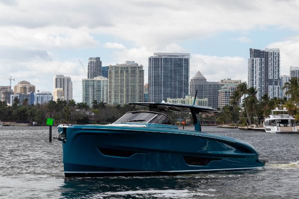 Slide: The Image of 2024 Solaris Power 52 Open yacht cruising near city skyline. - 3