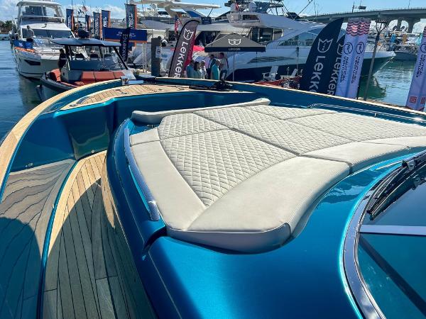 Slide: The Image of 2024 Solaris Power 52 Open luxury yacht at a boat show. - 9