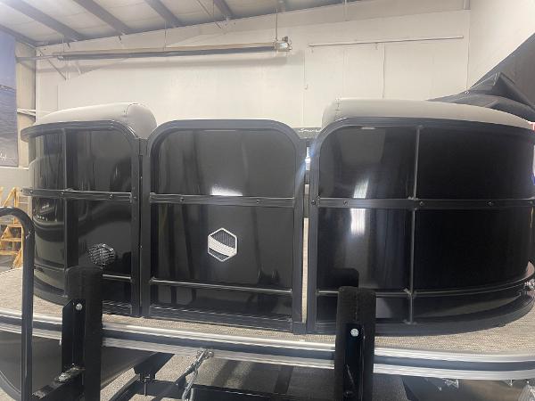 Slide: The Image of 2023 South Bay S224 UL pontoon boat in a showroom. - 5