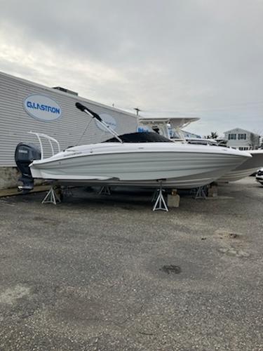 Slide: The Image of 2024 SouthWind 2600 SD boat on stands near Glastron building. - 0