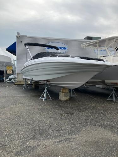 Slide: The Image of 2024 SouthWind 2600 SD boat on display at a dealership. - 2