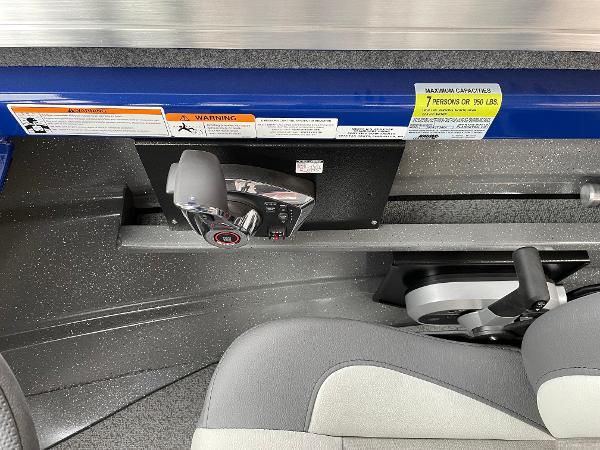 Slide: The Image of Control panel of 2024 Spartan 200 Astoria boat with capacity labels. - 11