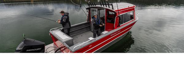 Slide: The Image of 2024 Spartan 240 Maximus Pro boat with anglers fishing on a calm lake. - 1