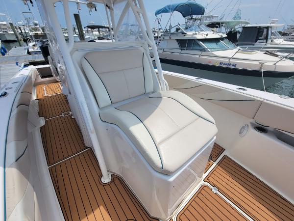 Slide: The Image of 2018 Spectre 35 Center Console by Pilini, luxury seating and teak flooring. - 10