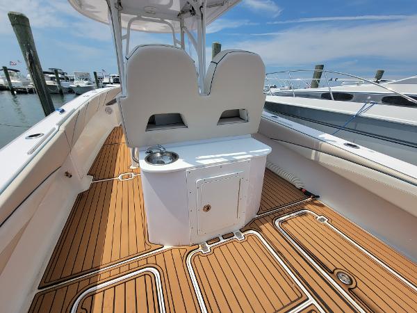 Slide: The Image of 2018 Spectre 35 Center Console by Pilini, teak deck, docked at marina. - 15