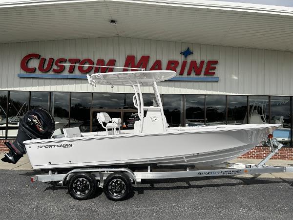 Slide: The Image of 2024 Sportsman Masters 227 Bay Boat at Custom Marine dealership. - 1