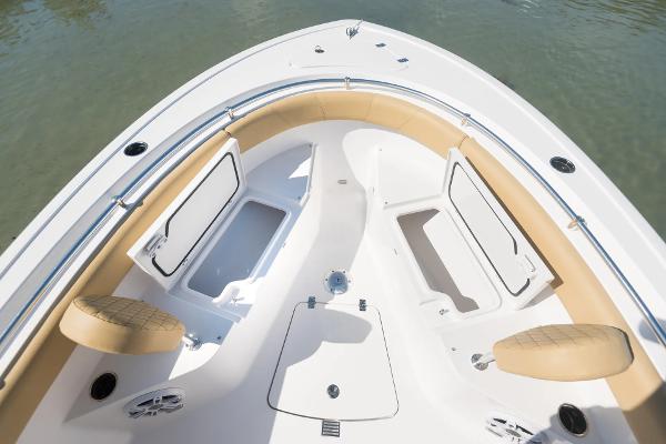 Slide: The Image of Manufacturer Provided Image: 2025 Sportsman Open 232 Center Console boat interior with storage compartments. - 3