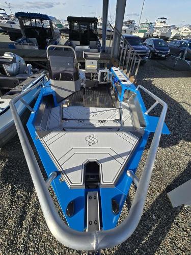 Slide: The Image of 2024 Stabicraft 1550 Frontier boat on display at a marina. - 3