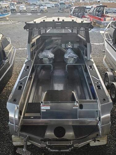 Slide: The Image of 2024 Stabicraft 1850 Supercab Adventure boat, rear view, showcasing spacious interior and dual seats. - 5