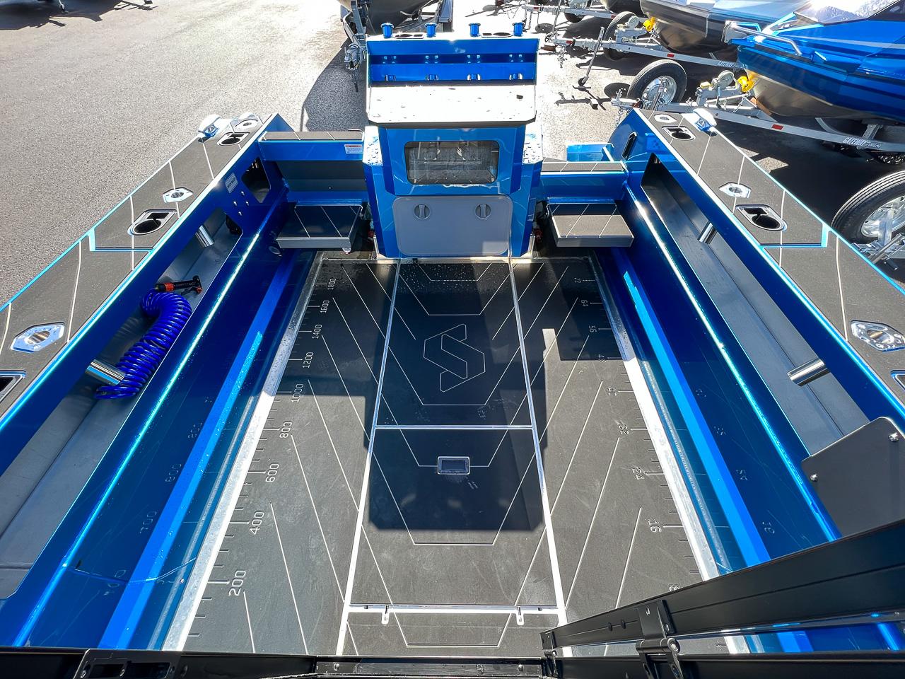 Slide: The Image of 2023 Stabicraft 2500 Ultracab XL boat interior, featuring spacious deck and modern design. - 20