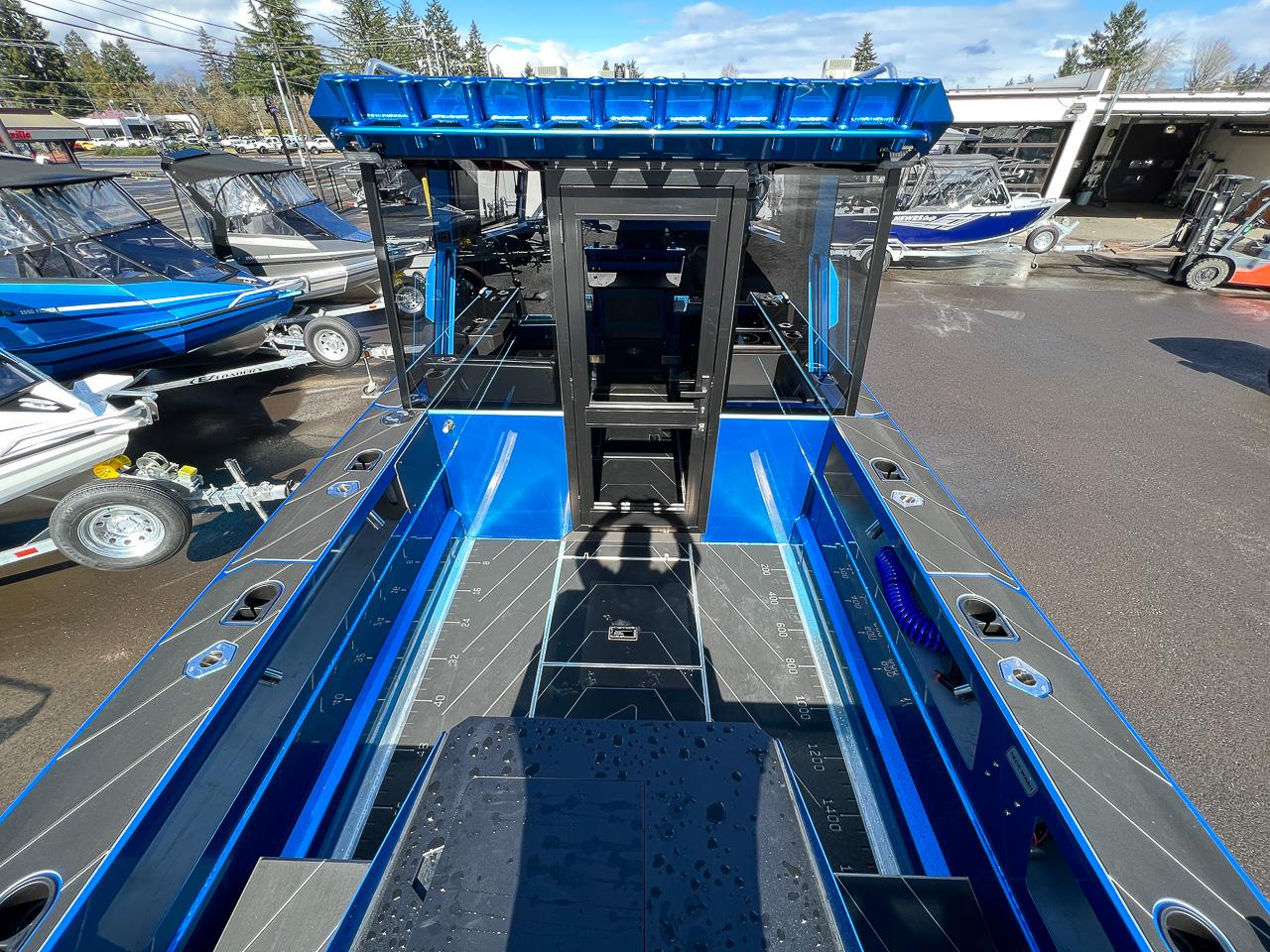 Slide: The Image of 2023 Stabicraft 2500 Ultracab XL boat interior view at dealership. - 22