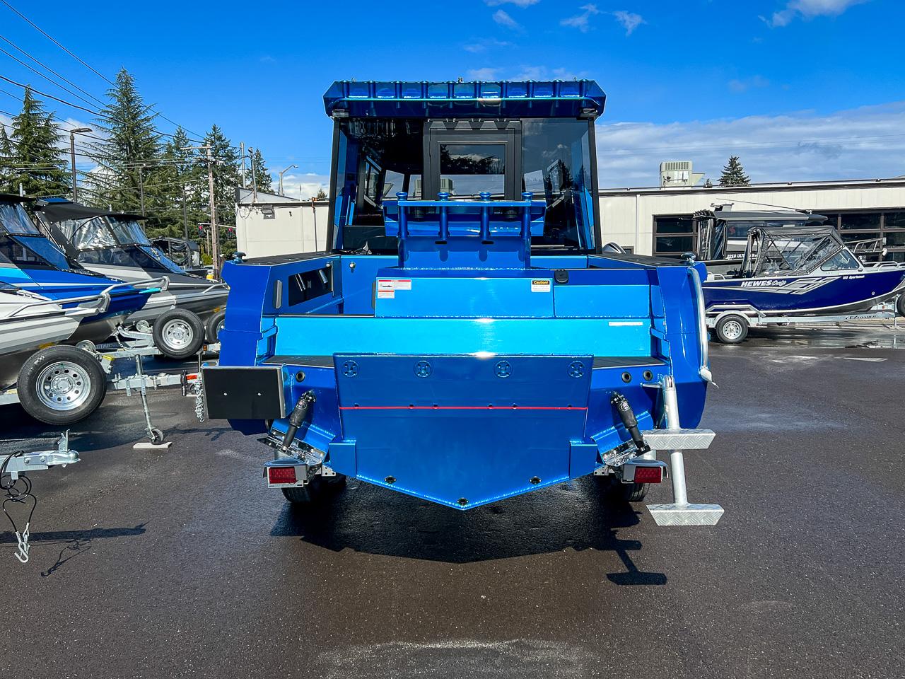 Slide: The Image of 2023 Stabicraft 2500 Ultracab XL boat, rear view, in a dealership lot. - 4